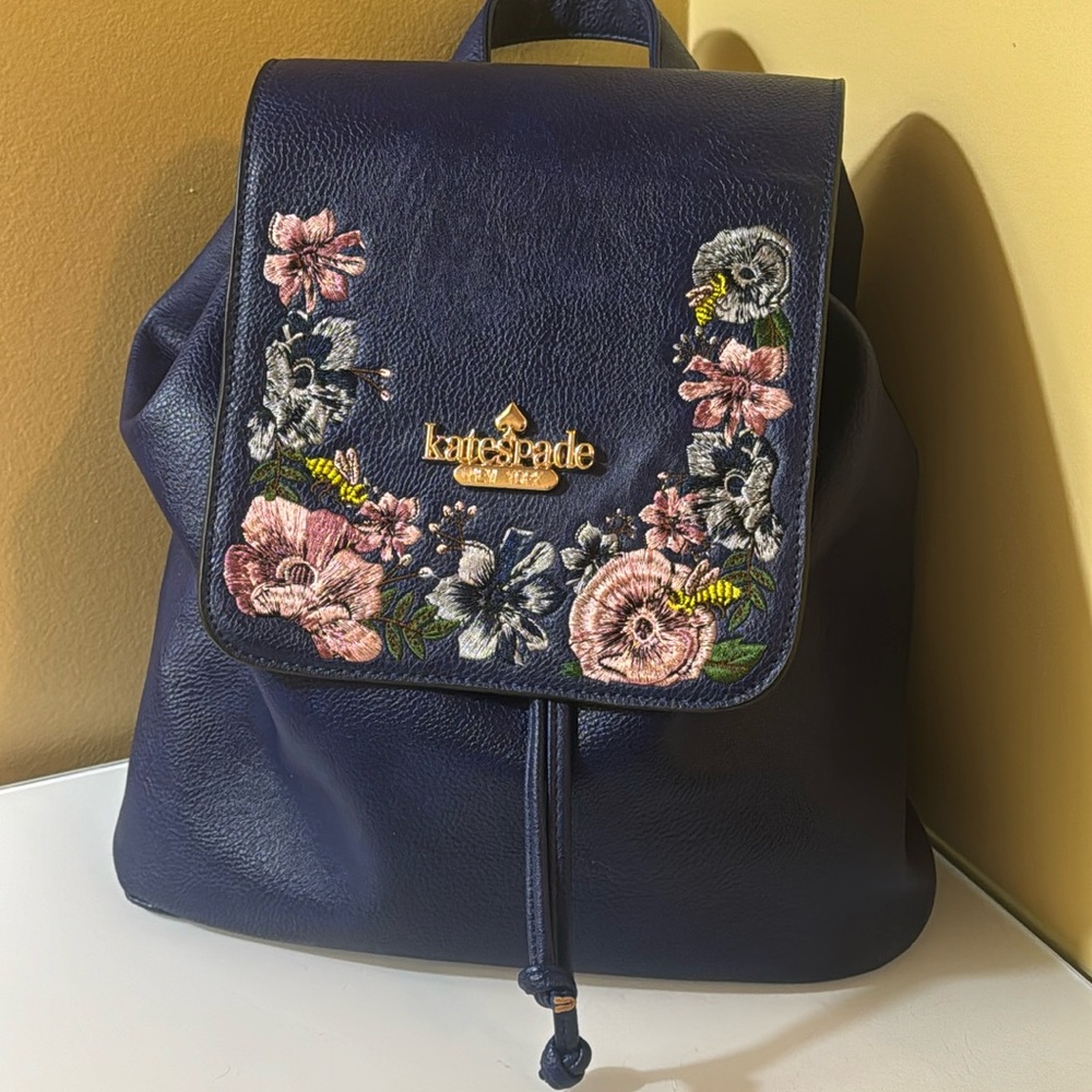 None authentic Kate spade drawstring and magnetic close back pack